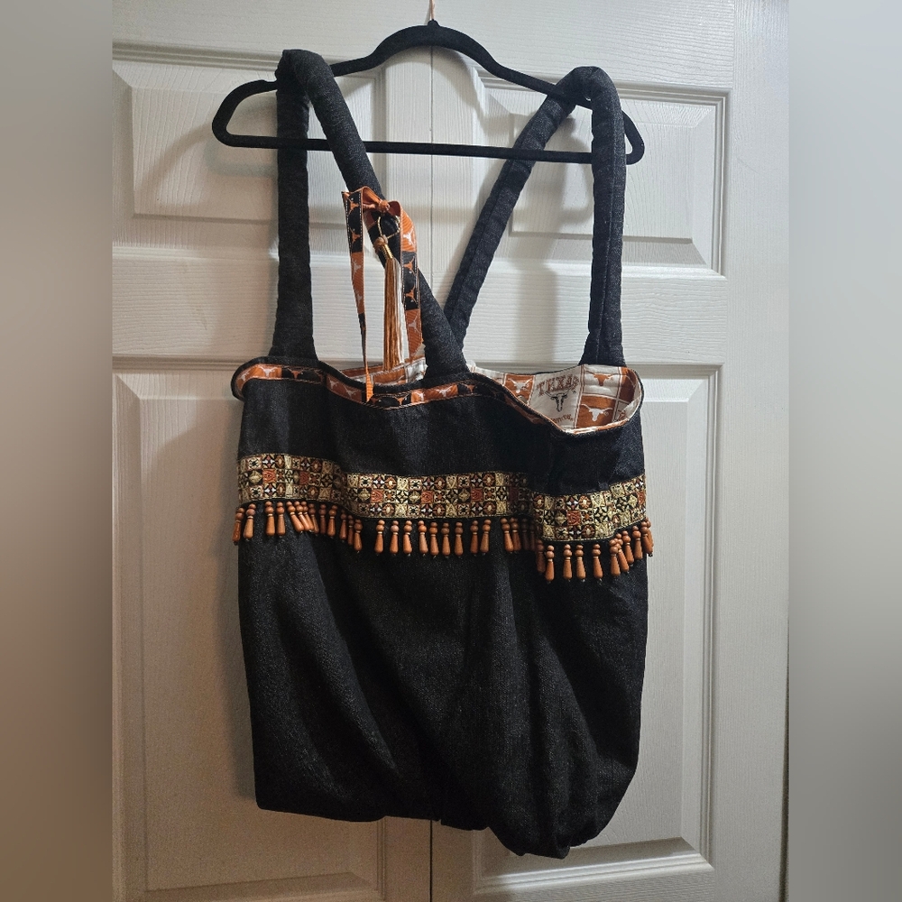 Linda Tucker Black Tote Bag University of Texas. Dimensions 18.5Hx16W